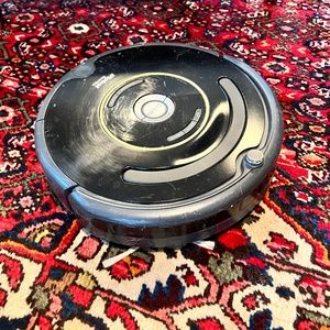 Roomba Vacuum- clean and works perfectly